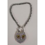 A silver bracelet with an owl shaped padlock clasp, set with agate, 6½" long