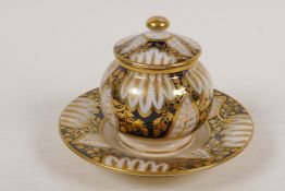 A C19th Crown Derby porcelain ink well with traditional leaf decoration in blue and gilt, 3" high