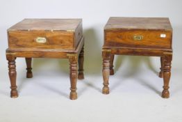 A pair of padouk wood campaign style side tables with brass mounts and single drawer with military