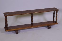 A mahogany dwarf open shelf, 43" x 11" x 15"