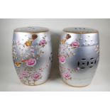 A pair of oriental porcelain barrel seats decorated with flowers, 18" high