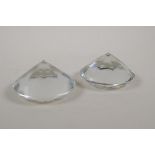 A pair of diamond shaped glass paperweights, 4" diameter