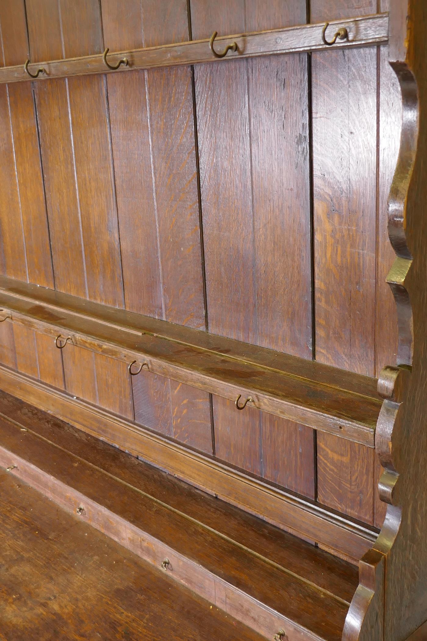 A Georgian oak Welsh potboard dresser, the upper rack with shaped frieze and two shelves, the base - Image 5 of 5