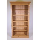 A pine open bookcase with five adjustable shelves, 73" x 39" x 12"