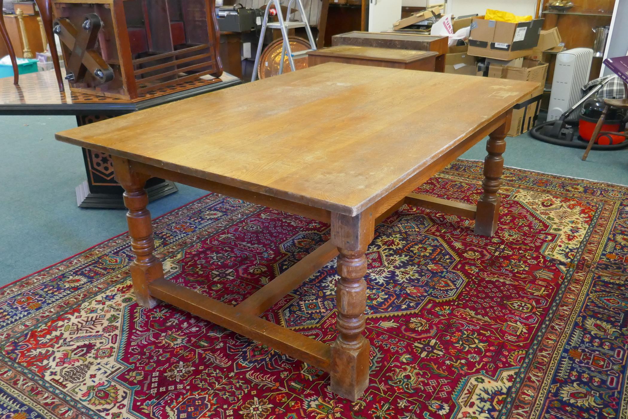 A mid-C20th oak refectory table, 72" x 48", 30" high
