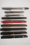 A collection of Mabie Todd fountain pens including a USA made sterling silver Swiss Military pen,