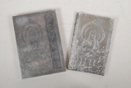 A Chinese silvered metal box containing a metal leaved concertina book with repousse inscriptions