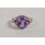 A 10ct white gold, amethyst and diamond set ring, size N/O