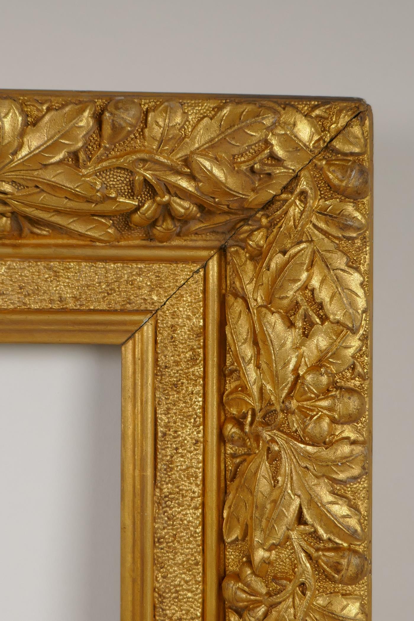 A C19th gilt composition picture frame, with leaf and fruit decoration, rebate 16" x 26" - Image 4 of 4