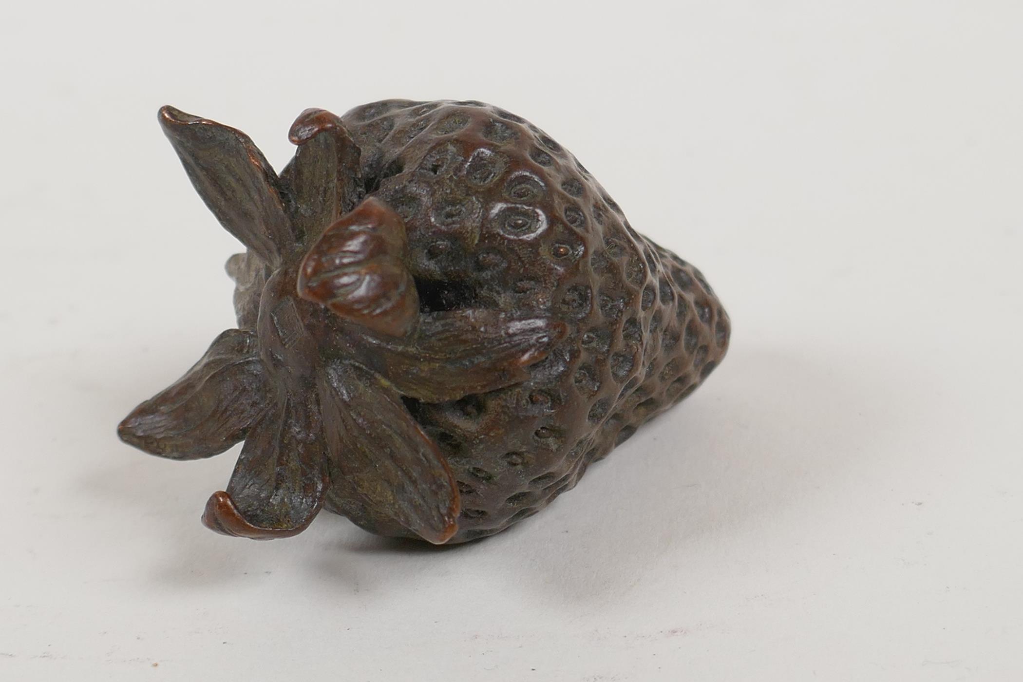 A Japanese bronze okimono in the form of a strawberry, 2" long - Image 2 of 3