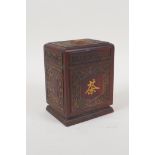 A carved and inlaid hardwood tea caddy, decorated with Chinese character inscriptions and auspicious