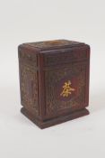 A carved and inlaid hardwood tea caddy, decorated with Chinese character inscriptions and auspicious