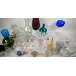 A quantity of ornamental glassware including fisherman's float, decanters, paperweights etc