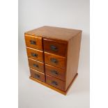 An oriental hardwood eight drawer jewellery chest, 13" x 10" x 8"