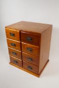 An oriental hardwood eight drawer jewellery chest, 13" x 10" x 8"