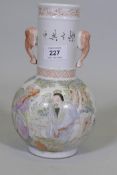A Chinese Republic style famille vert ceramic vase, decorated with figures playing go, with