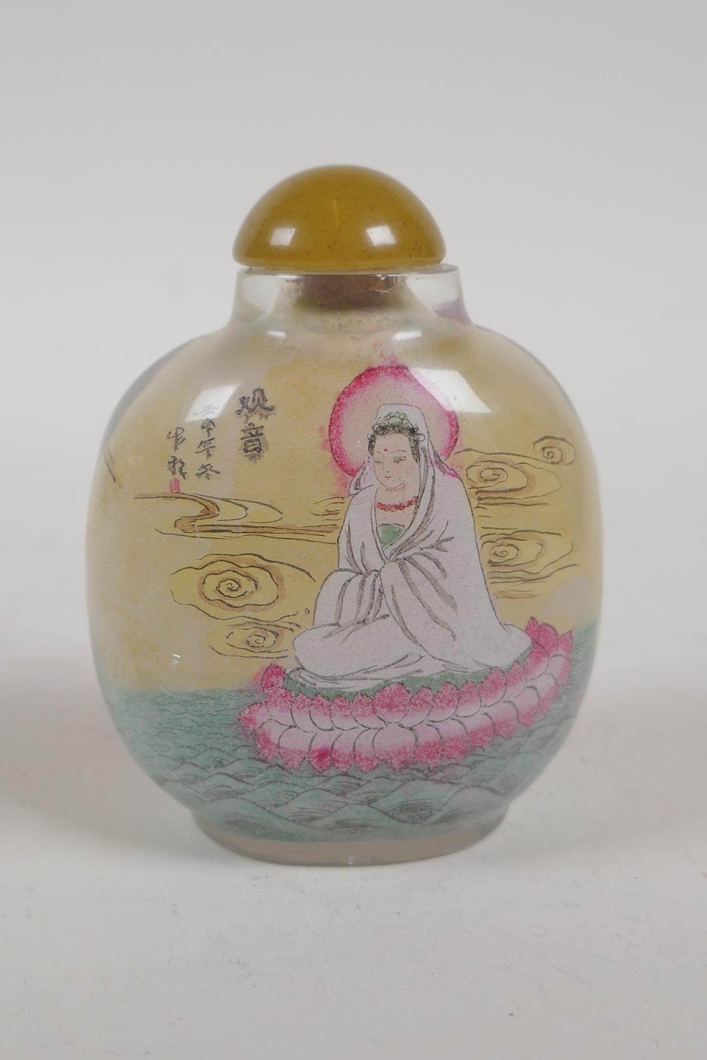 A Chinese reverse decorated glass snuff bottle depicting the great wall and a portrait of a noble, - Image 4 of 5