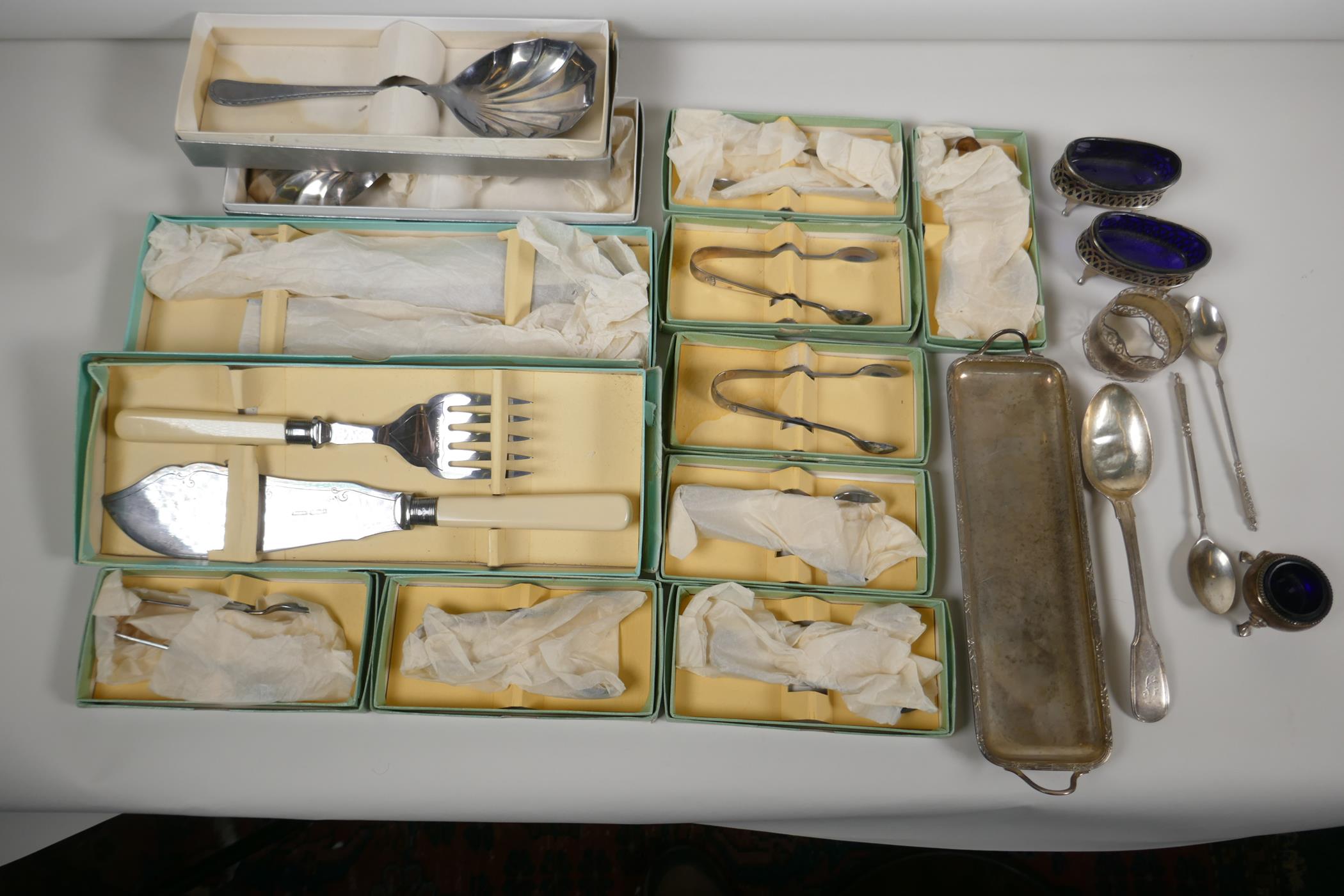 Hallmarked 925 silver to include eight boxed sugar tongs, two boxed fruit servers and various salts,