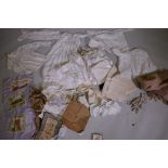 A quantity of antique and vintage embroidered linen and lace