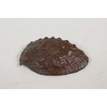 A Japanese bronze okimono of an oyster shell, indistinct impressed mark to interior, 3" wide