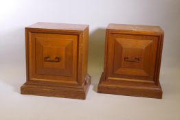 A pair of Younger mahogany pedestal cabinets, with moulded doors and plinth bases, 28" x 20" x 28"