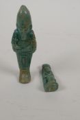 An Egyptian turquoise glazed faience shabti and another smaller Egyptian token, largest 4½" high