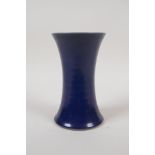 A Chinese powder blue glazed porcelain vase of waisted form, 6½" high