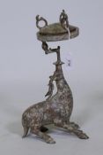 An oriental bronze censer in the form of a deer, 14" high