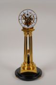 A brass fusee skeleton clock with enamelled dial and Arabic numerals, 11½" high