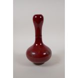 A flambe glazed porcelain garlic head vase, Chinese KangXi mark to base, 8" high