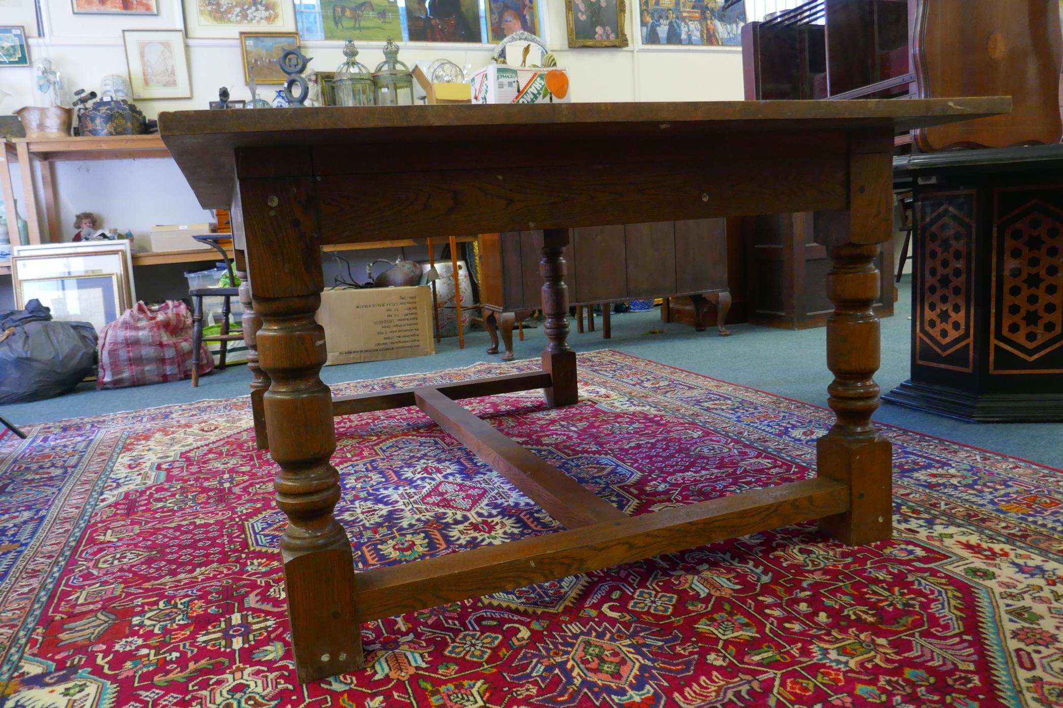 A mid-C20th oak refectory table, 72" x 48", 30" high - Image 5 of 7