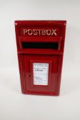 A metal post box with cast front and sheet construction, embossed 'Post Box', 17" high