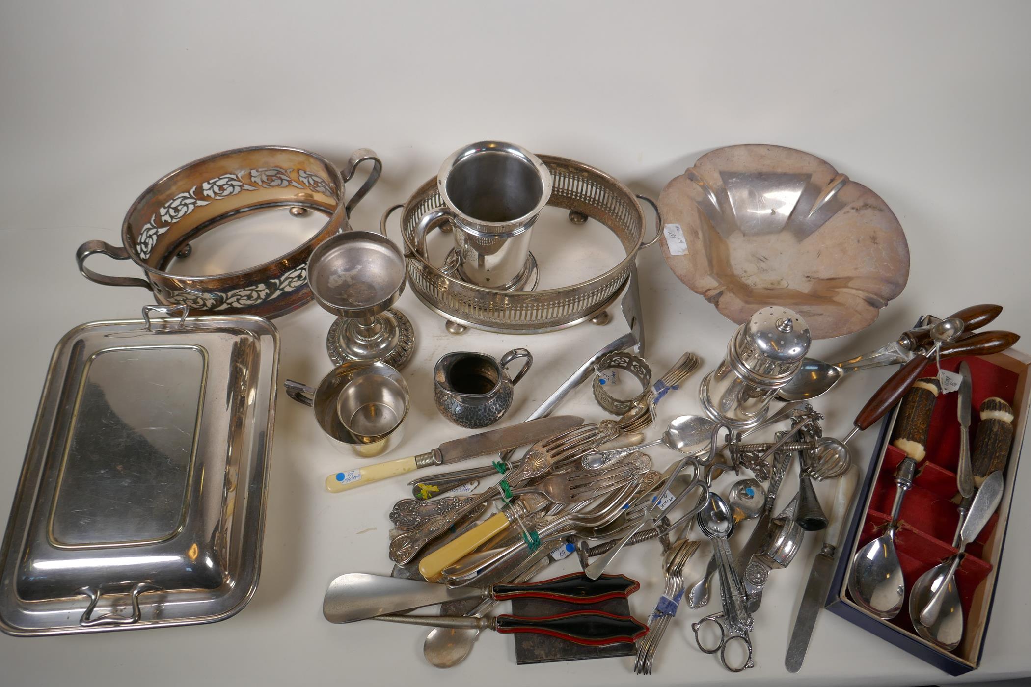 A quantity of silver and silver plated items including mirrors, flatware, coasters, Mappin & Webb