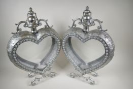 A pair of heart shaped metal lanterns, 21" high