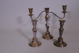 A two branch silver plated candelabrum and matching pair of candlesticks, 11" high