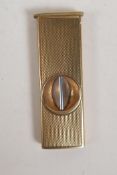 A 9ct gold cigar cutter by S.J. Rose & Son, 2" long, 12g gross