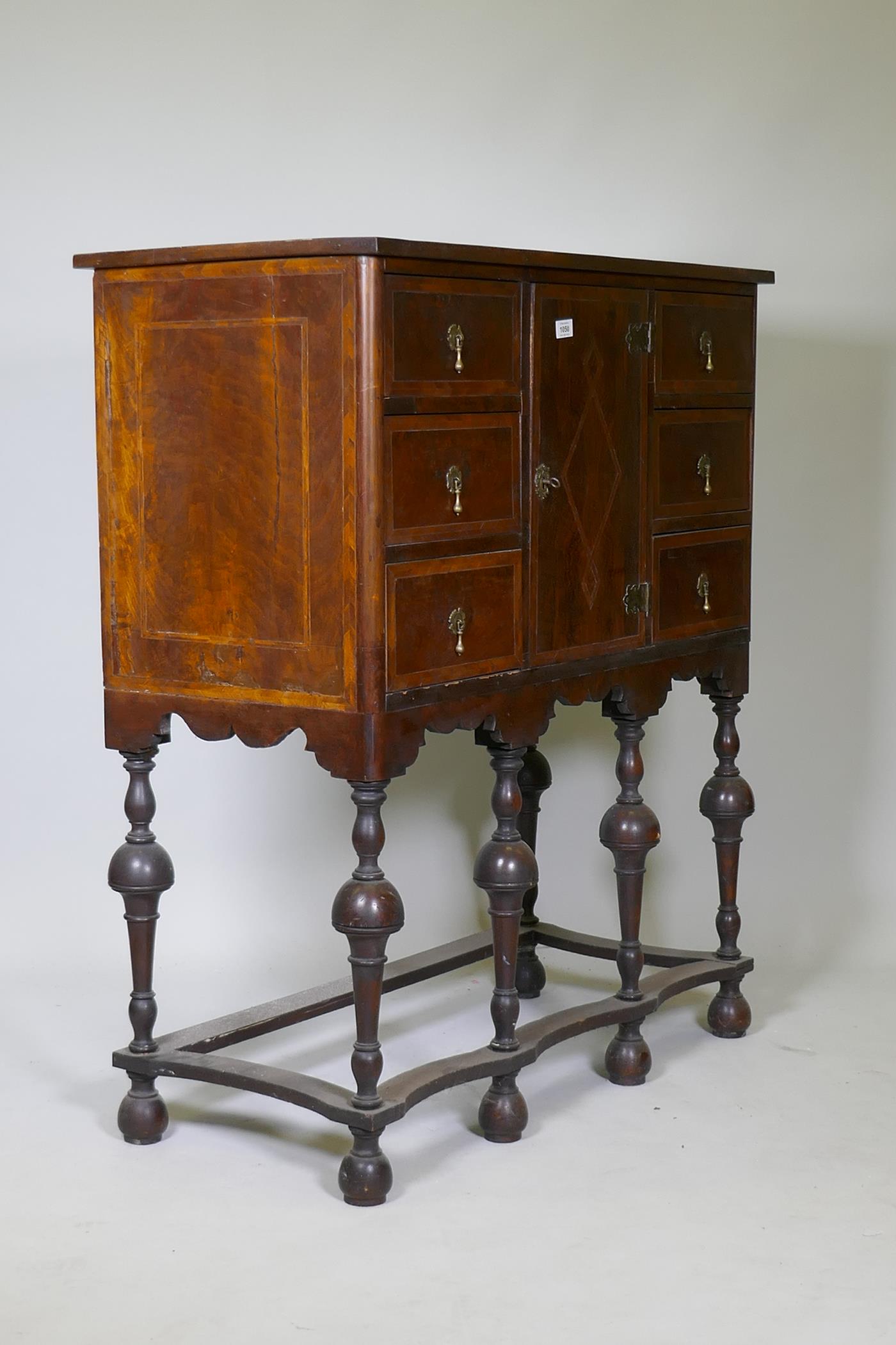 A C19th walnut cabinet on stand, with feather banded inlaid decoration, six drawers and central - Image 7 of 8