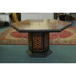 A slate centre table inlaid with marble veneered decoration, minor repair to top and loss to base,
