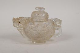 A Chinese archaic style moulded glass/crystal tea pot with dragon decoration to handle and spout, 5"