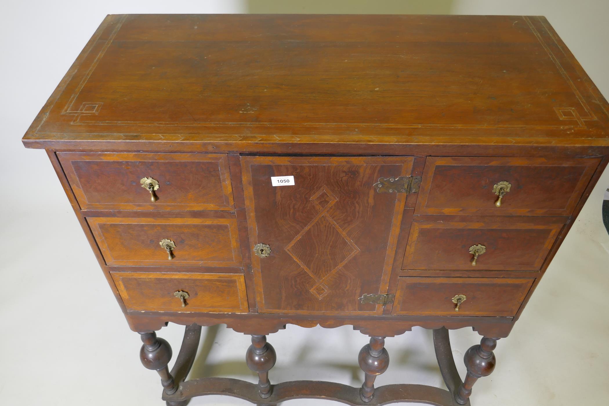 A C19th walnut cabinet on stand, with feather banded inlaid decoration, six drawers and central - Image 3 of 8