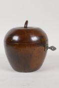 A Georgian style fruit wood tea caddy in the form of an apple, 4" high