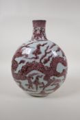 A Chinese red and white porcelain moon flask with dragon decoration, 12" high