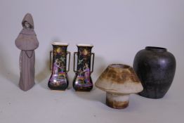 A Poole Pottery Calypso black lustre glazed vase, 8" high, a studio pottery vase, impressed LW to