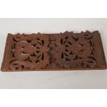 A Black Forest wood bookslide carved with vine leaves and fruit, 13" long closed