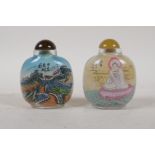 A Chinese reverse decorated glass snuff bottle depicting the great wall and a portrait of a noble,