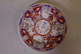 A C19th cabinet plate decorated in the Imari palette, 10" diameter