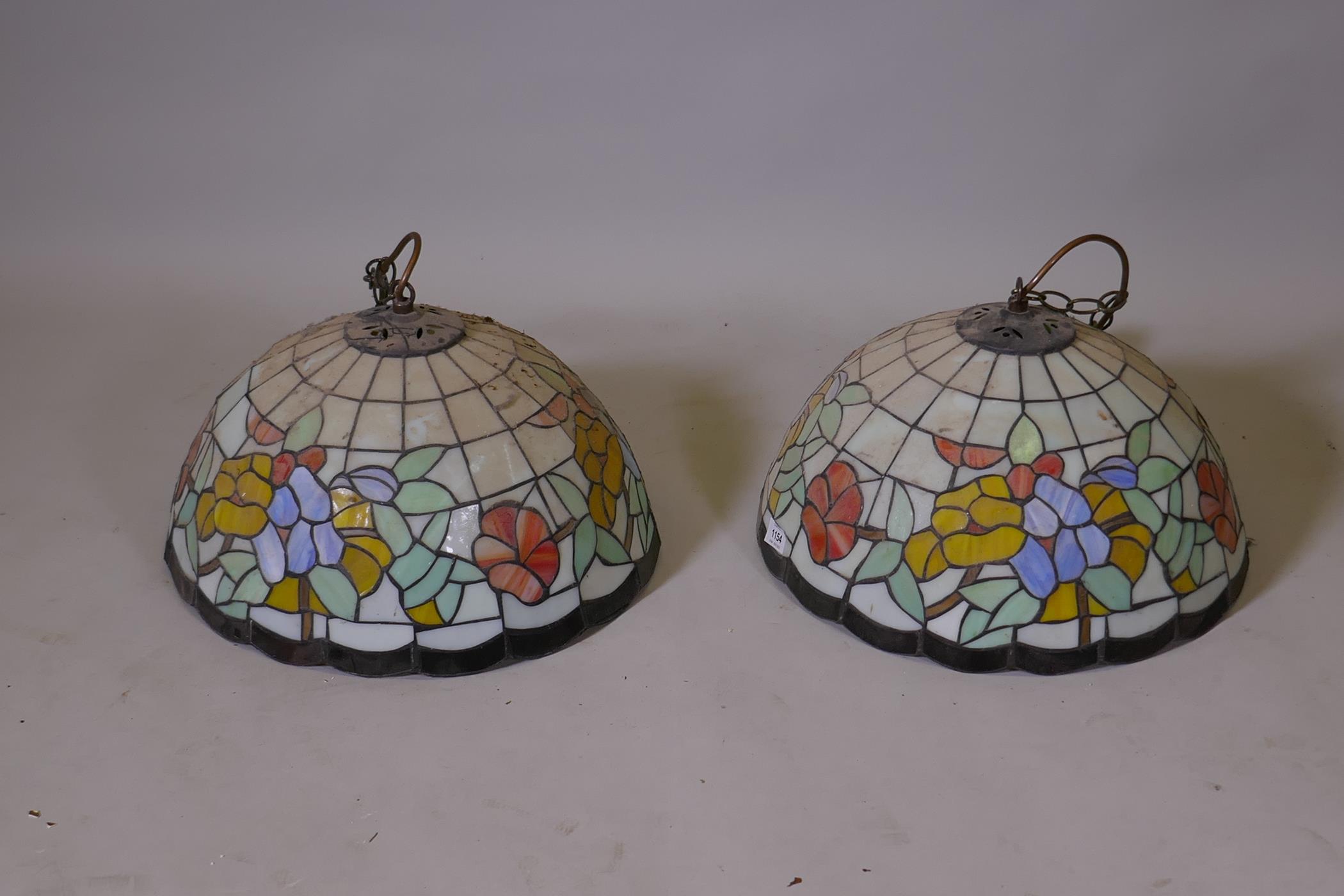 A pair of Tiffany style glass ceiling lamp shades, 15" diameter x 10" high