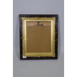 An early C20th gilt picture frame, mounted in a glazed mahogany box frame, 17" x 20" x 2"