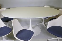 An Arkana tulip boardroom/dining table, No 30, and five Arkana 103 chairs and a 116 swivel chair,