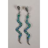 A pair of silver and plique a jour serpent earrings, 3" drop